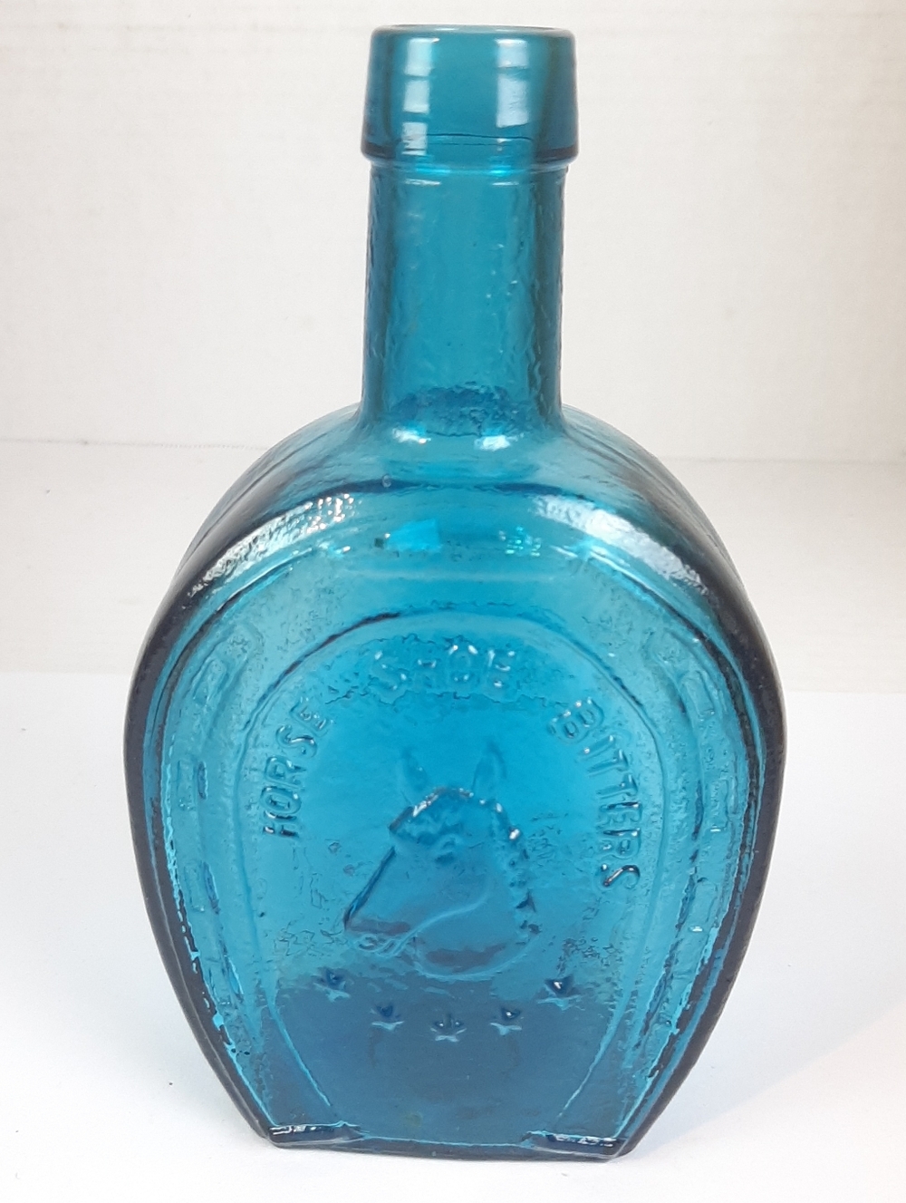 Vintage 7" Wheaton Horse Shoe Bitters MedicineCo. Blue Glass Bottle Empty